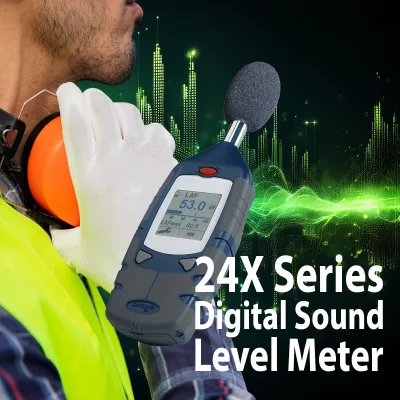 Worker wearing a high‑visibility vest and glove uses a 24X Series digital sound level meter to measure ambient noise.